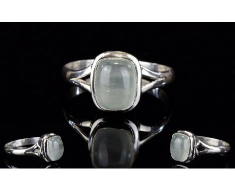 Aquamarine Cabochon Solitaire Ring, a cushion cut natural aquamarine of 2.3cts, in a silver bezel setting; size Q