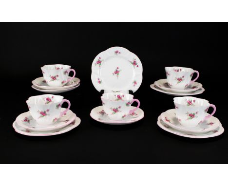 Shelley Bone China Part Tea Service In Rose Spray no. 13545 Comprises eleven pieces in total to include four trios of cup sau