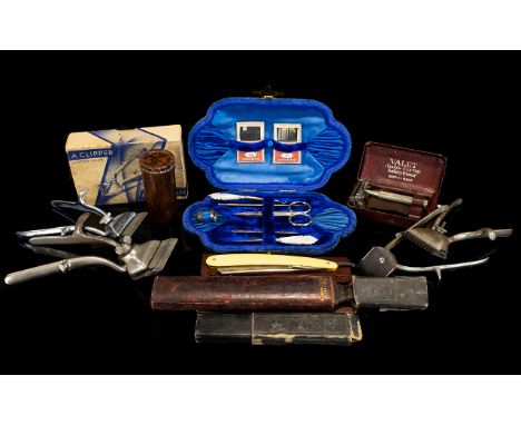 A Collection Of Vintage Vanity Items To include cased manicure set, several pairs of clippers, boxed 'Valet' razor etc. A var
