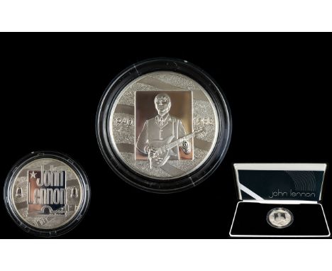 John Lennon Beatles Interest Royal Mint Commemorative Coin 1940 -1980 Boxed silvered coin with impressed John Lennon Portrait