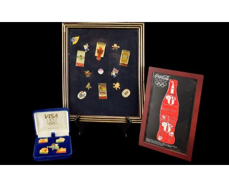 Olympic Interest A Varied Collection Of Enamel Pin Badges Three items in total to include rare, boxed collection of Visa Barc