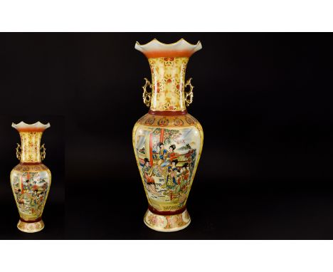 A Large Reproduction Oriental Vase Tall Satsuma style vase with fluted neck, gilt handles and profuse multi colour figurative