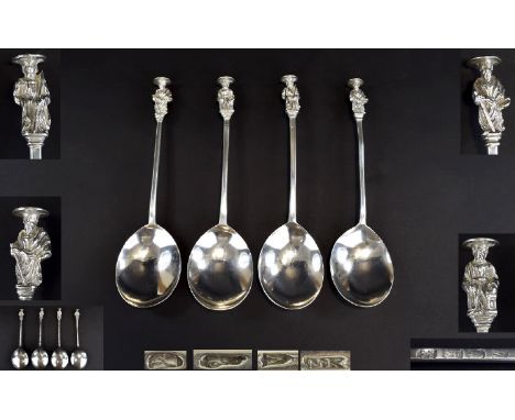 18th Century Matched Set of Four Silver Spoons with Later Attached White Metal Figural Finials. (The finials are not hallmark