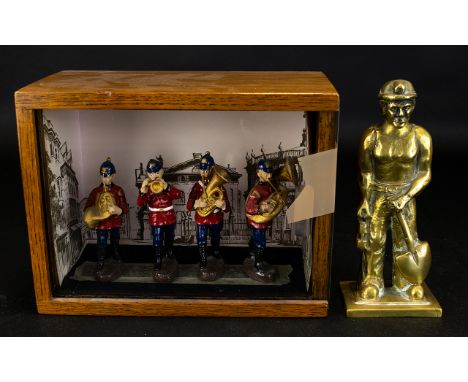 A Vintage Cased Display Of Figures Wood case with sliding glass door insert containing four models in the form of a military 