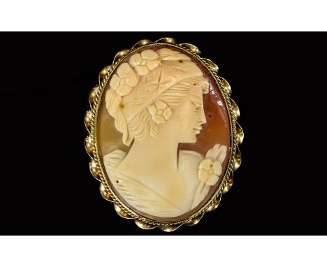 A Vintage Nice Quality Oval Shaped Shell Cameo, Depicting a Portrait of a Classical Maiden, within a 9ct Gold Mount. Fully Ha