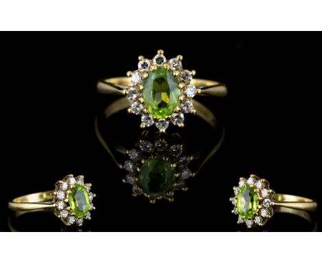 18ct Gold Peridot and Diamond Set Cluster Ring, Flower head Setting. Fully Hallmarked. The Central Faceted Peridot of Good Co