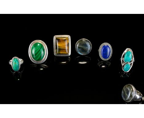 Silver And Stone Set Rings A collection of six handmade silver rings each set with natural stones. To include, oval lapis rin