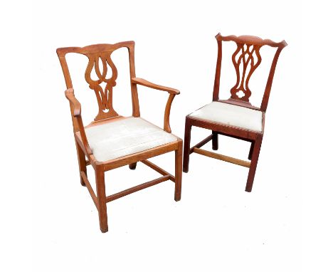 A 19th century Country Chippendale style armchair, together with four single chairs