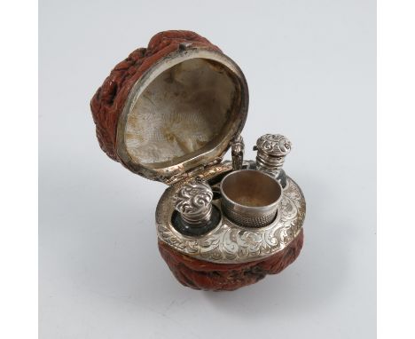 A 19th century walnut etui, the hinged nut fitted with a hallmarked silver thimble, two glass scent bottles with hinged embos