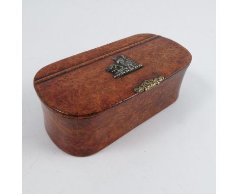 A 19th century burr wood snuff box, of rectangular form with rounded ends, with gilt metal scroll push open, the top decorate