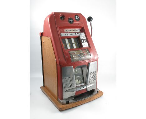 A Sega Bell one arm bandit fruit machine