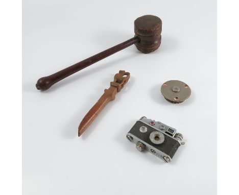 A boxed Lumix camera table lighter, together with a silver plated card marker with rotating dial and stamped D.R.G.M.S, a tur