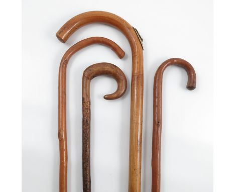 A bamboo effect measure walking stick, with inset measure measuring in centimetres and hands, spirit level missing, together 