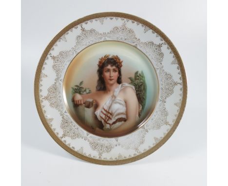 A Rosenthal porcelain cabinet plate, the centre printed with a portrait of a female in Classical dress, diameter 10ins Condit
