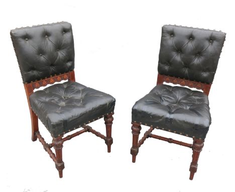 A set of four Edwardian oak chairs, with deep button back