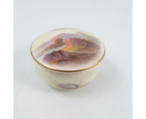 A Royal Worcester circular patch box and cover, the cover decorated with a castle in landscape by Rushton, dated 1921, af, di