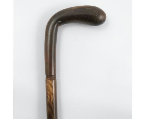 A horn walking stick, the shaft made in sections, with scroll handle, height 36.25ins Condition report: There are seven diffe