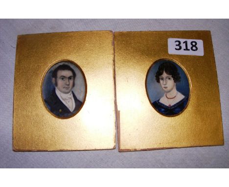 Two miniature portrait paintings on board of a lady and gentleman. 