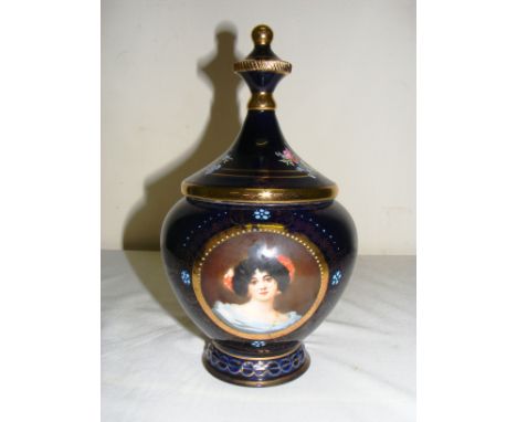 A Vienna porcelain jar & cover painted in cobalt blue, with raised blue enamel and gilding & a portrait of a lady, measuring 