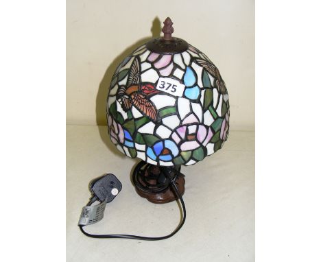 A Tiffany style table lamp.