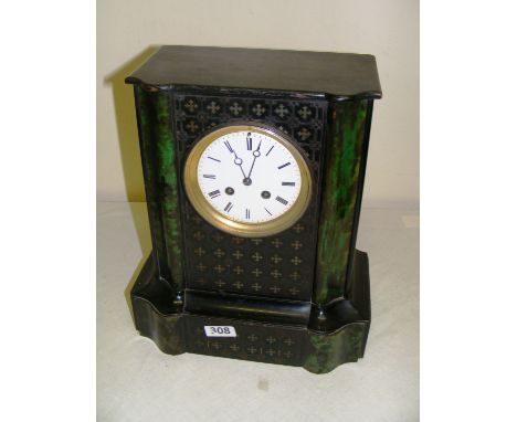 A wooden cased mantle clock, with enamel dial and Roman numerals, the movement striking on a bell signed P.L TRE, 801, measur