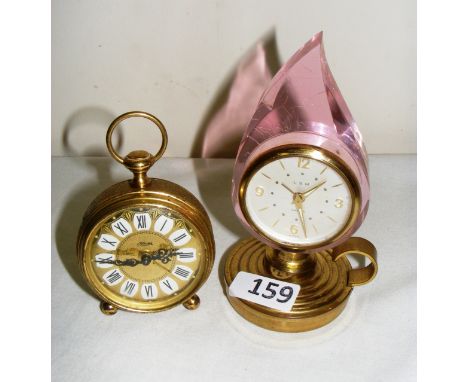 Two vintage German alarm clocks including a Kaiser & LSM example.