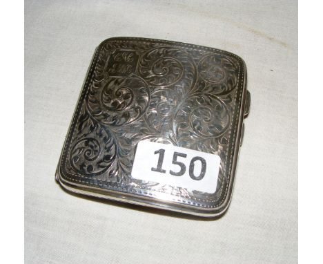 A sterling silver cigarette case ornately chased with scrolls of flowers and hallmarked for Birmingham, weighing 95 grams.