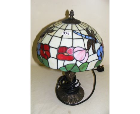 A Tiffany style table lamp.