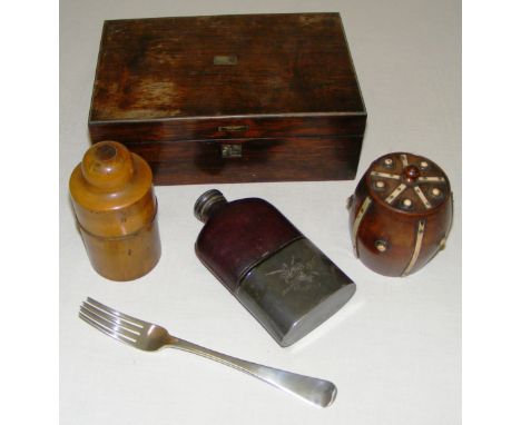 A sterling silver fork hallmarked for Sheffield 1900 (66.1 grams), a burr walnut Gilbertson & Sons bottle holder, a bone moun