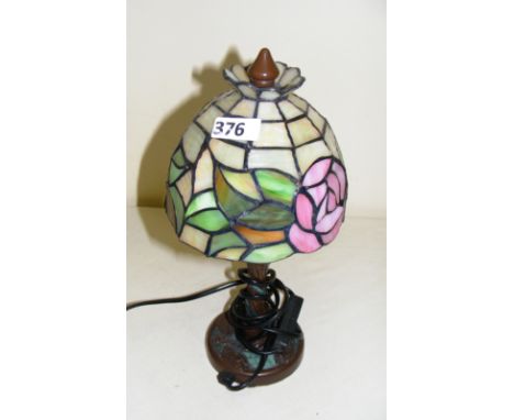 A Tiffany style table lamp.