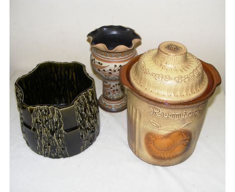 A Rumtopf jar (af), a planter & jardiniere stand.