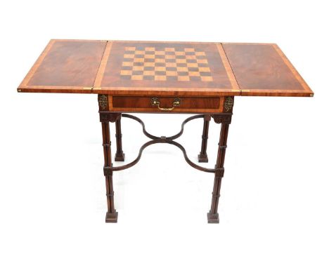 Mahogany games table Late 20th-century mahogany games table, square top with two hinged leaves opening to reveal checkerboard