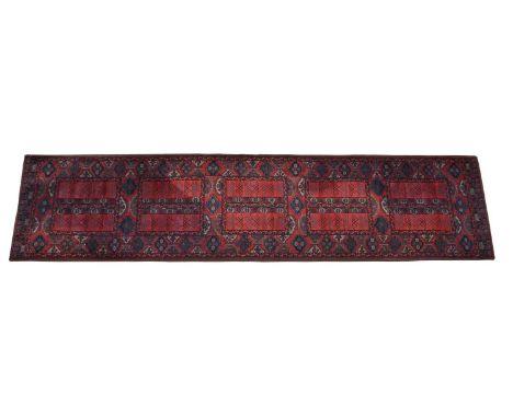Persian style runner Late 20th-century machine made Persian style runner, red ground with five square central medallions over