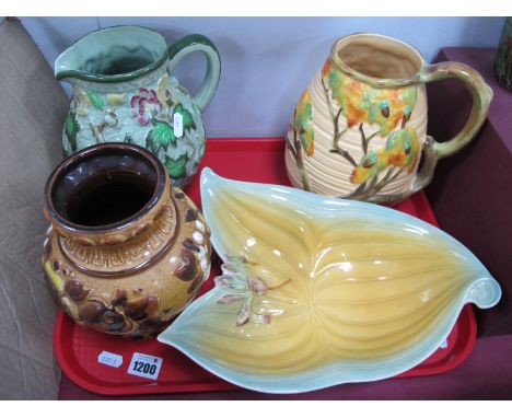 A Carlton Ware Ribbed and Leaf Moulded Jug, with twig handle, Radford leaf and flower mottled jug, a shorter shaped bowl and 