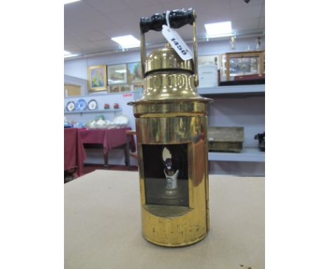 A Brass Hand Lamp, possibly Railway with turned handle, and Sherwoods wick holder, 22.5cm with handle down.