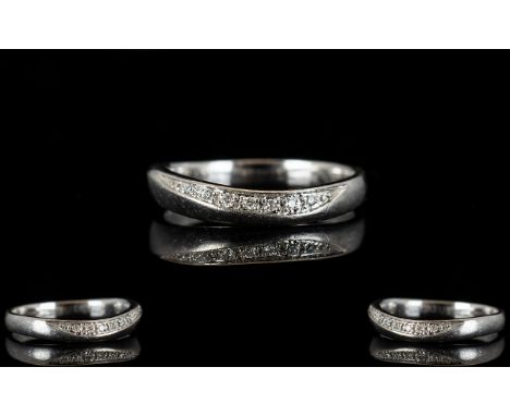 Platinum And Diamond Eternity Ring Set with round modern brilliant cut diamonds, fully hallmarked, weight 4 grams, ring size 