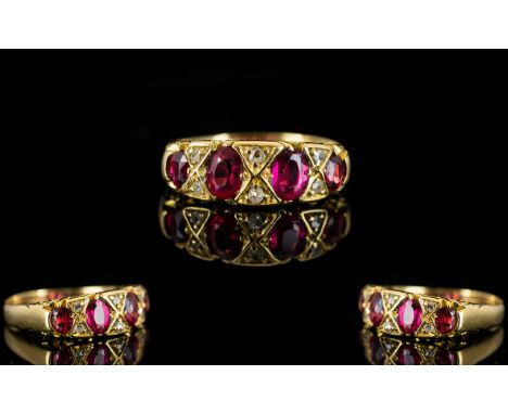 Antique Period Attractive 18ct Gold Ruby And Diamond Dress Ring The natural rubies of excellent colour, ring size M, hallmark