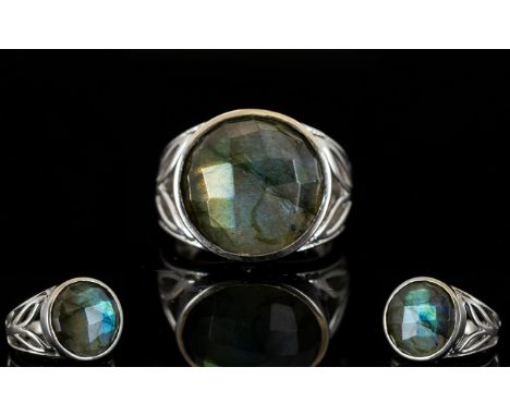 Labradorite Solitaire Ring, an 11ct round cut, chequerboard faceted labradorite, with a full display of blue labradorescence,