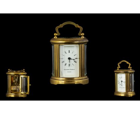 Matthew Norman Small Brass Carriage Clock of Pleasing Form with Glass Panels with Visible Open Lever Escapement, White Porcel