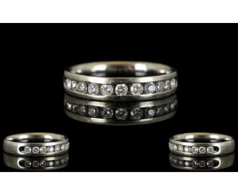 9ct Gold Diamond Eternity Ring Eleven diamonds channel set, fully hallmarked, ring size R 