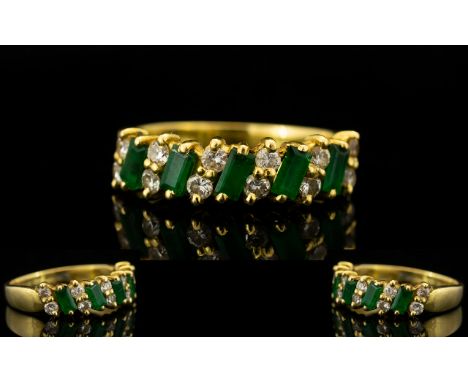 18ct Gold Emerald and Diamonds Set Dress Ring - of attractive form and nice design. The five step cut emeralds of good colour