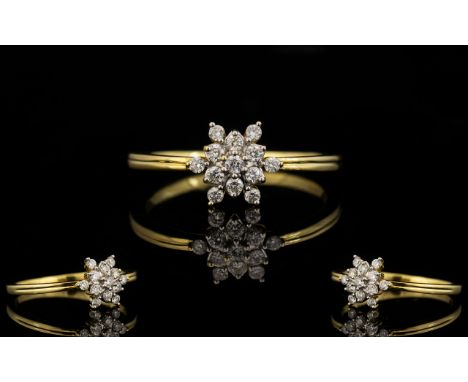 18ct Gold Diamond Set Cluster Ring - of attractive form and design. Full hallmark for 18ct. the diamonds of round brilliant c