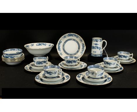 Wilton Ware Part Tea Service.  Lovely white china decorated with blue dragons made in Stoke on Trent.  Comprises:  6 tea cups