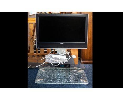 Toshiba Model 32WLT66 Television Complete with glass stand and Sky box.