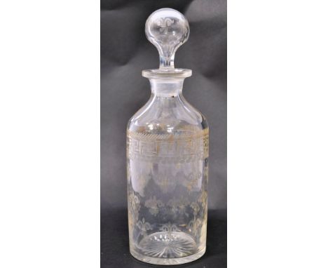 A 19th century Regency hand cut and etched glass decanter. Of cylindrical form with stunning fleur dy lys decoration having b