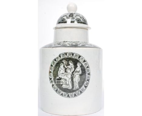 An 18th century pearlware ( pearl ware )underglaze black printed tea caddy with dome top, circa 1800. Painted with classical 
