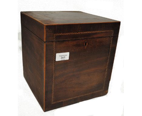 A 19th century Georgian mahogany inlaid decanter box celerette. Of square form with inlaid satinwood leading edges and cheque