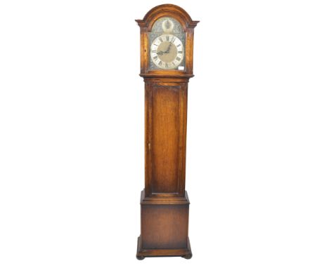 An early 20th century longcase / grandfather clock having a fabulous three train movement chiming on gong together with music