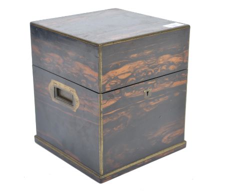 A 19th century coromandel and brass bound decanter box - celerette. Of square form with the hinged lid inset with a vacant br