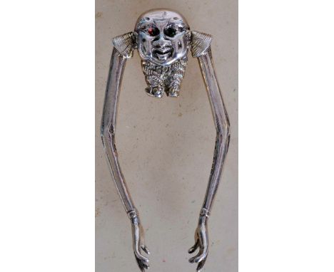 19th century Victorian Sugar Tongs in the form of Humpty Dumpty having inset ruby and emerald glass eyes. Hallmarked for like